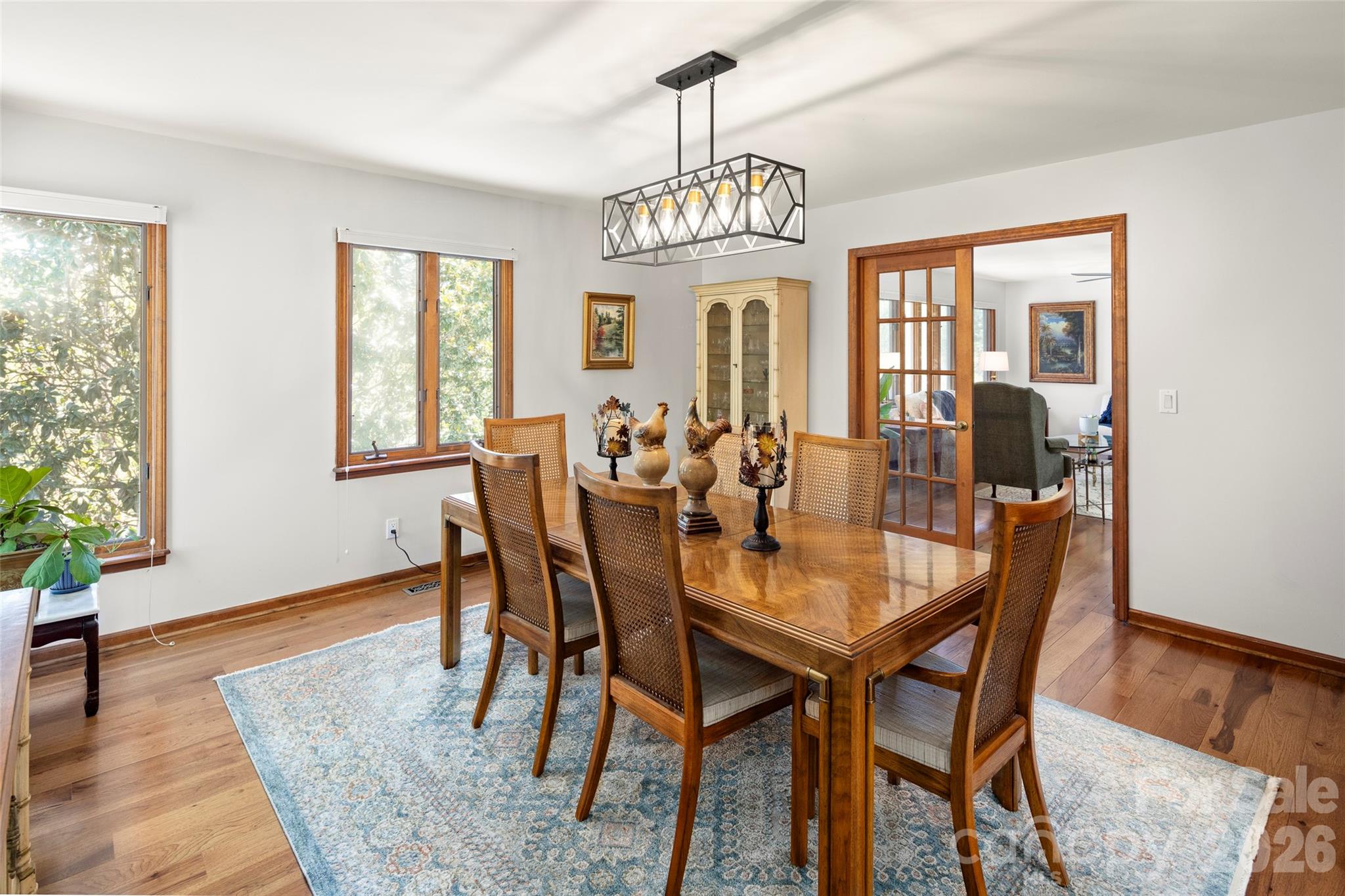 119 Rome Court Lake Lure, NC 28746 - Photo 15 of 31 a view of a dining room with furniture window and wooden floor