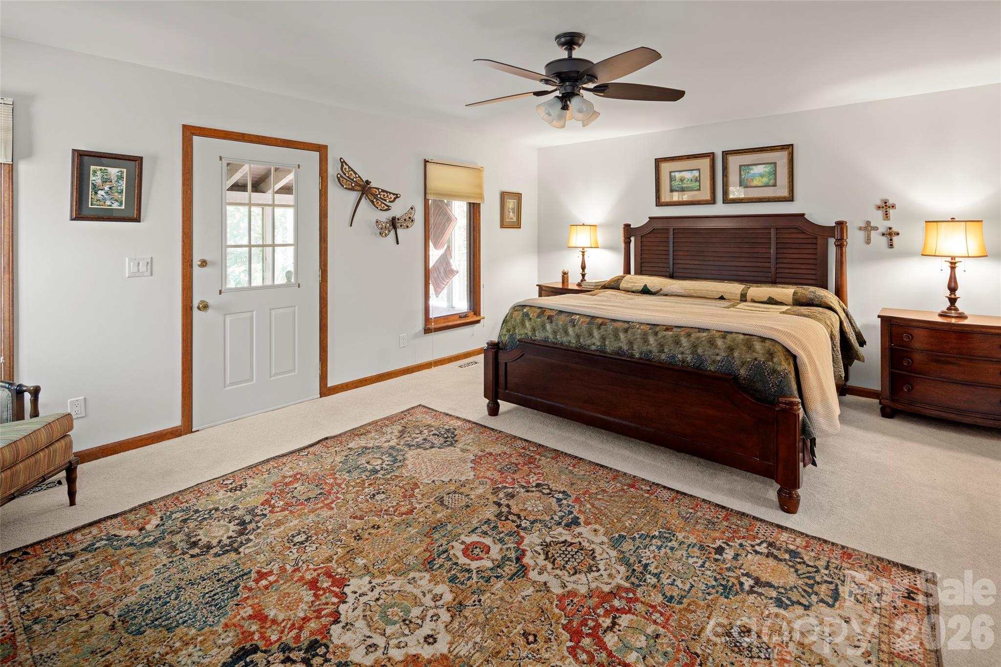 119 Rome Court Lake Lure, NC 28746 - Photo 16 of 31 a spacious bedroom with a bed and a window