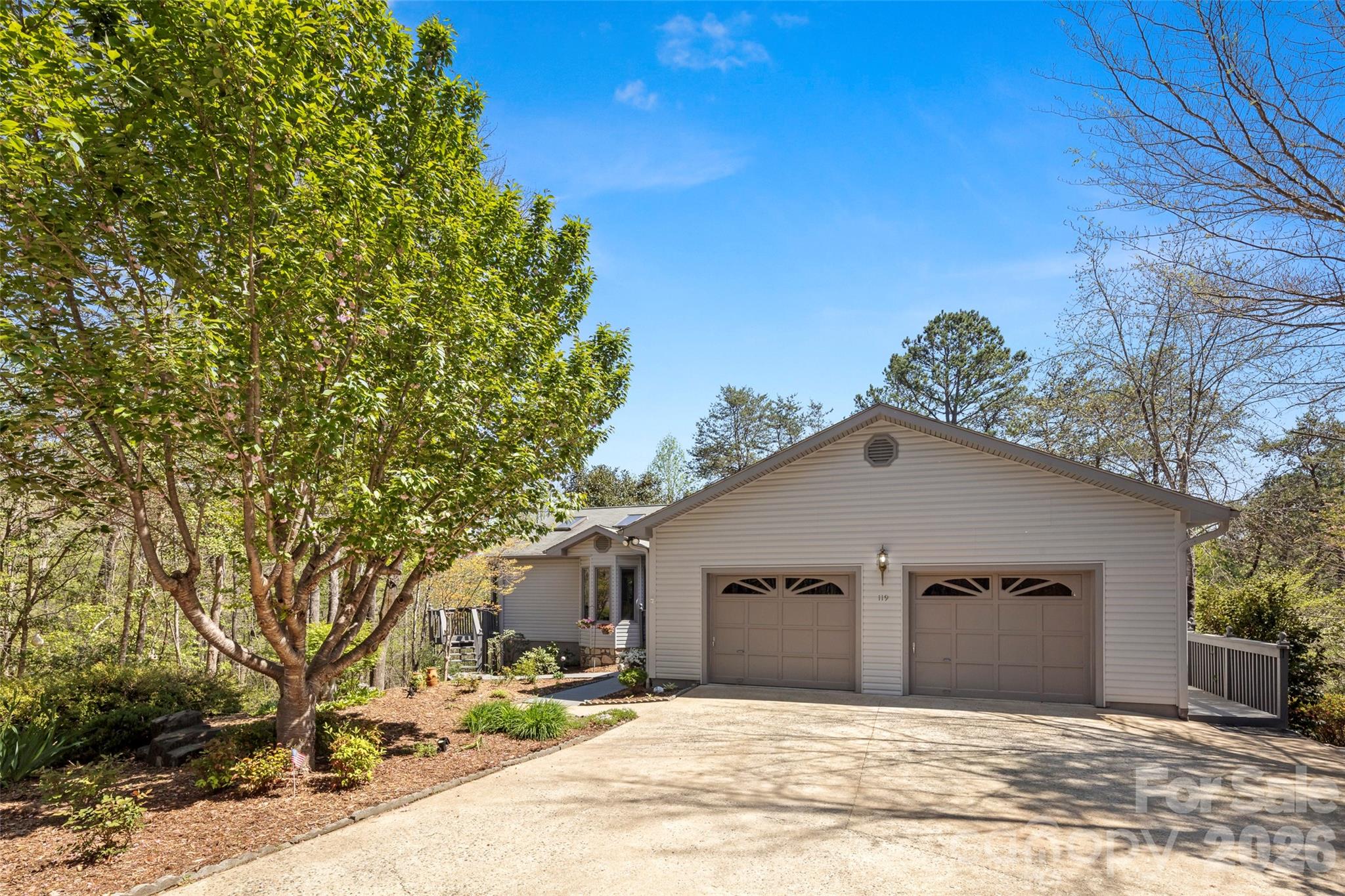 119 Rome Court Lake Lure, NC 28746 - Photo 2 of 31 a front view of a house with a yard