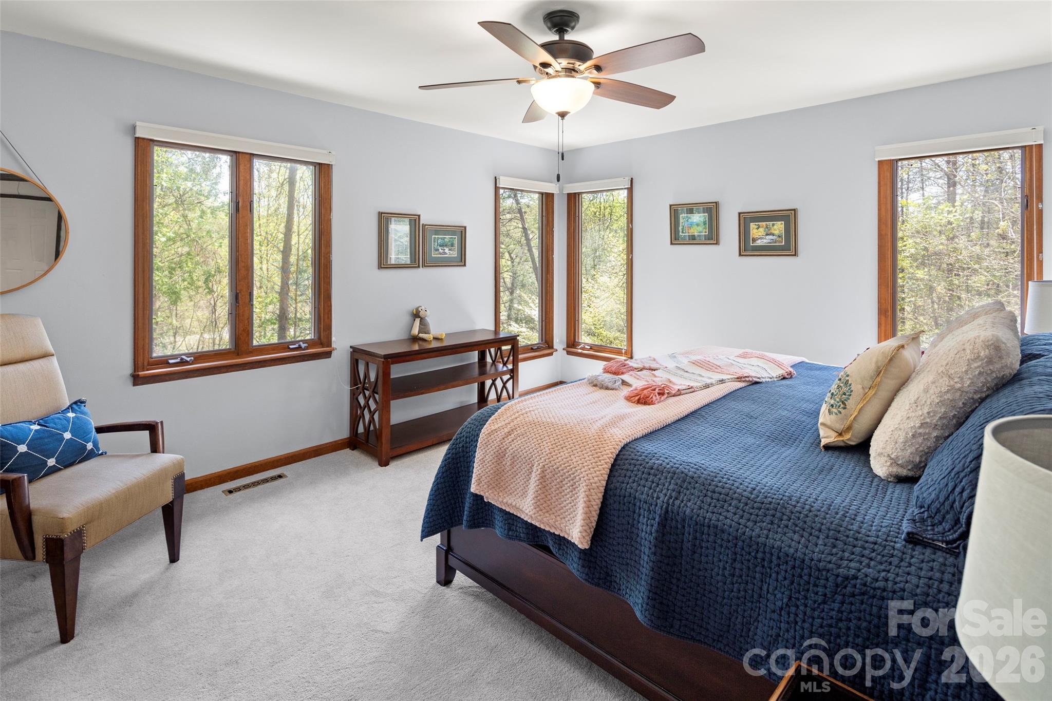 119 Rome Court Lake Lure, NC 28746 - Photo 21 of 31 a bedroom with a bed dresser and a window