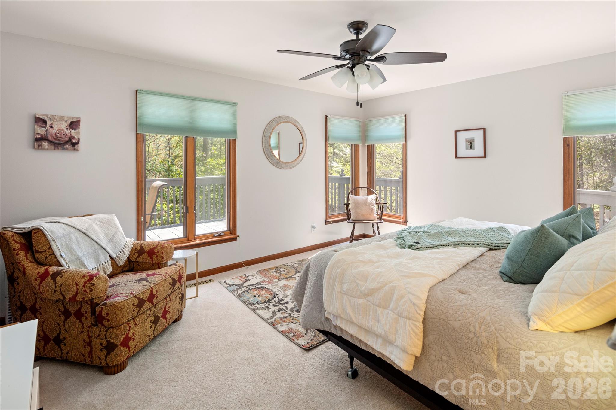 119 Rome Court Lake Lure, NC 28746 - Photo 26 of 31 a bedroom with a bed a couch and a window