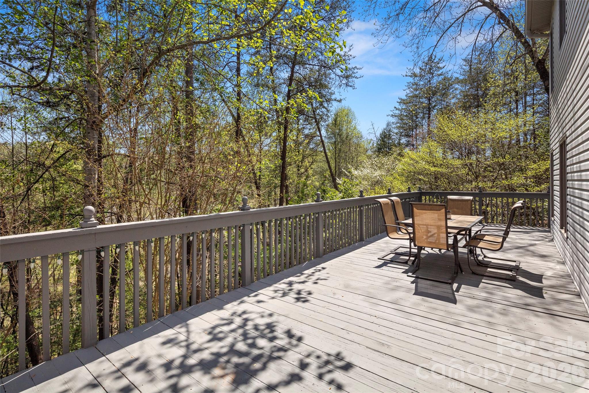 119 Rome Court Lake Lure, NC 28746 - Photo 29 of 31 a view of a chairs and table on the wooden floor