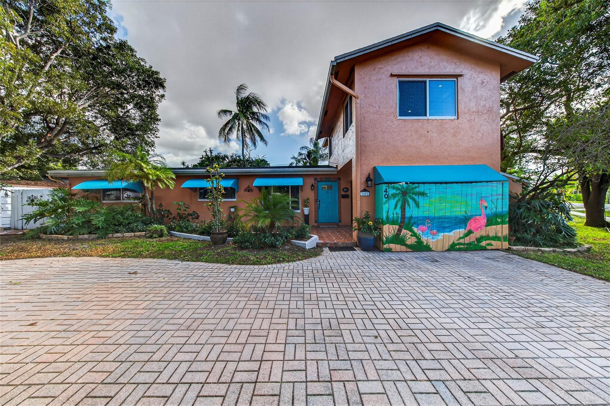 40 Southwest 9th Court Pompano Beach, FL 33060 - Photo 1 of 48 a view of a house with a patio