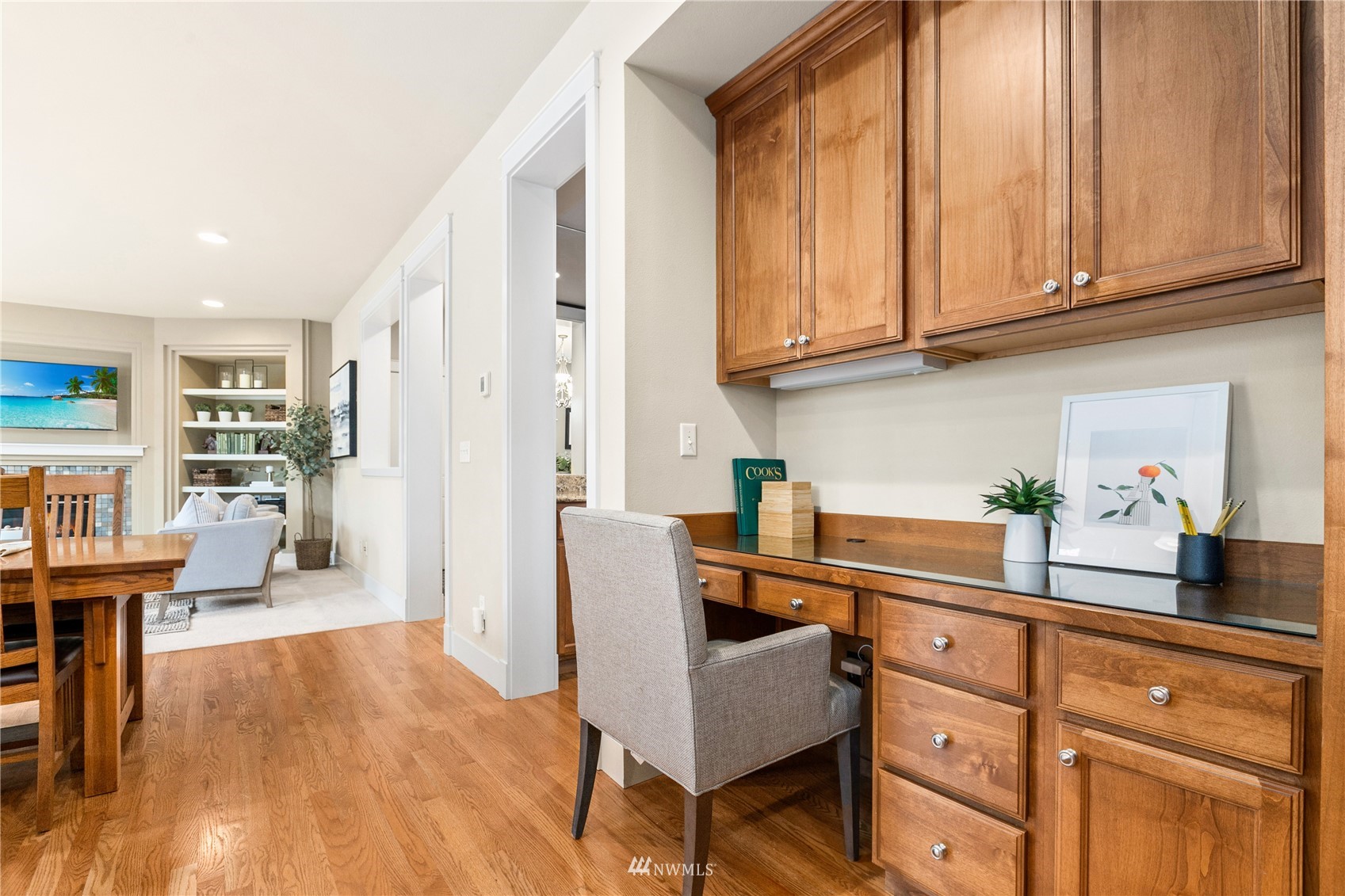 18407 36th Avenue Southeast Bothell, WA 98012 - Photo 11 of 39 a kitchen with stainless steel appliances granite countertop a refrigerator and wooden cabinets