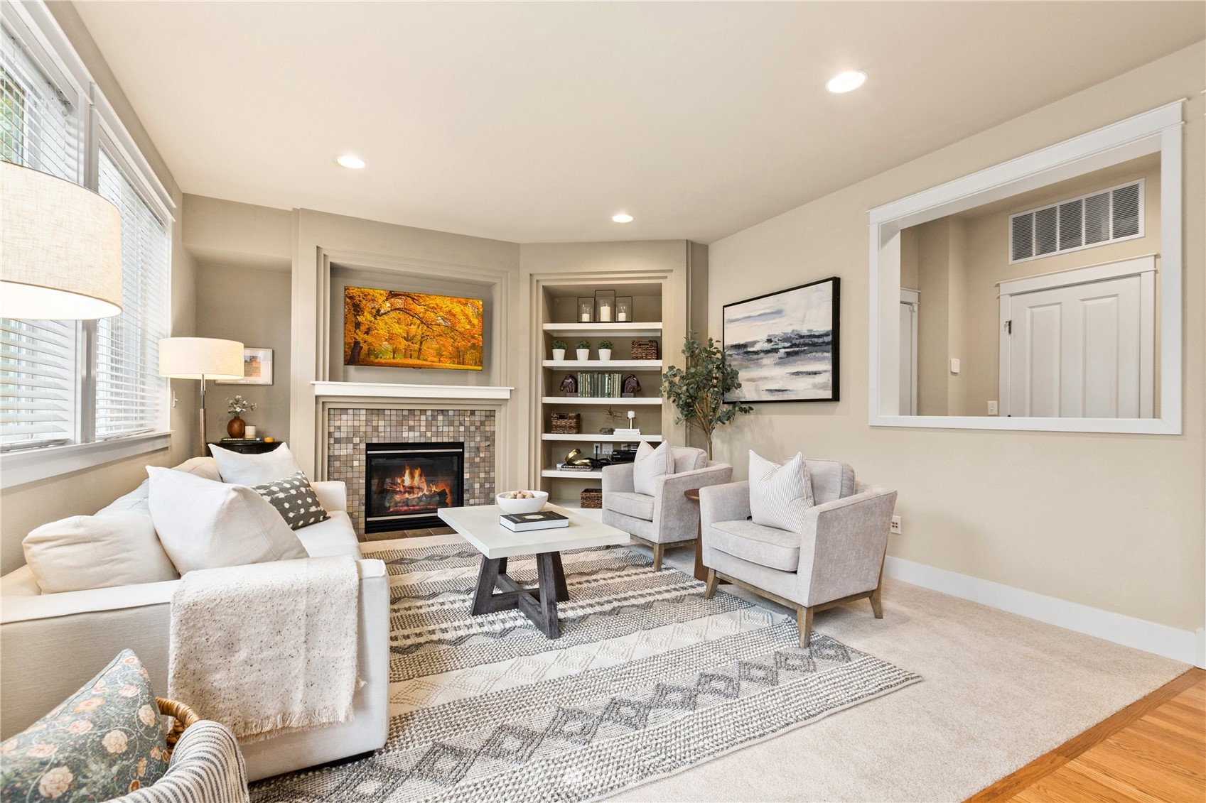 18407 36th Avenue Southeast Bothell, WA 98012 - Photo 12 of 39 a living room with furniture and a fireplace