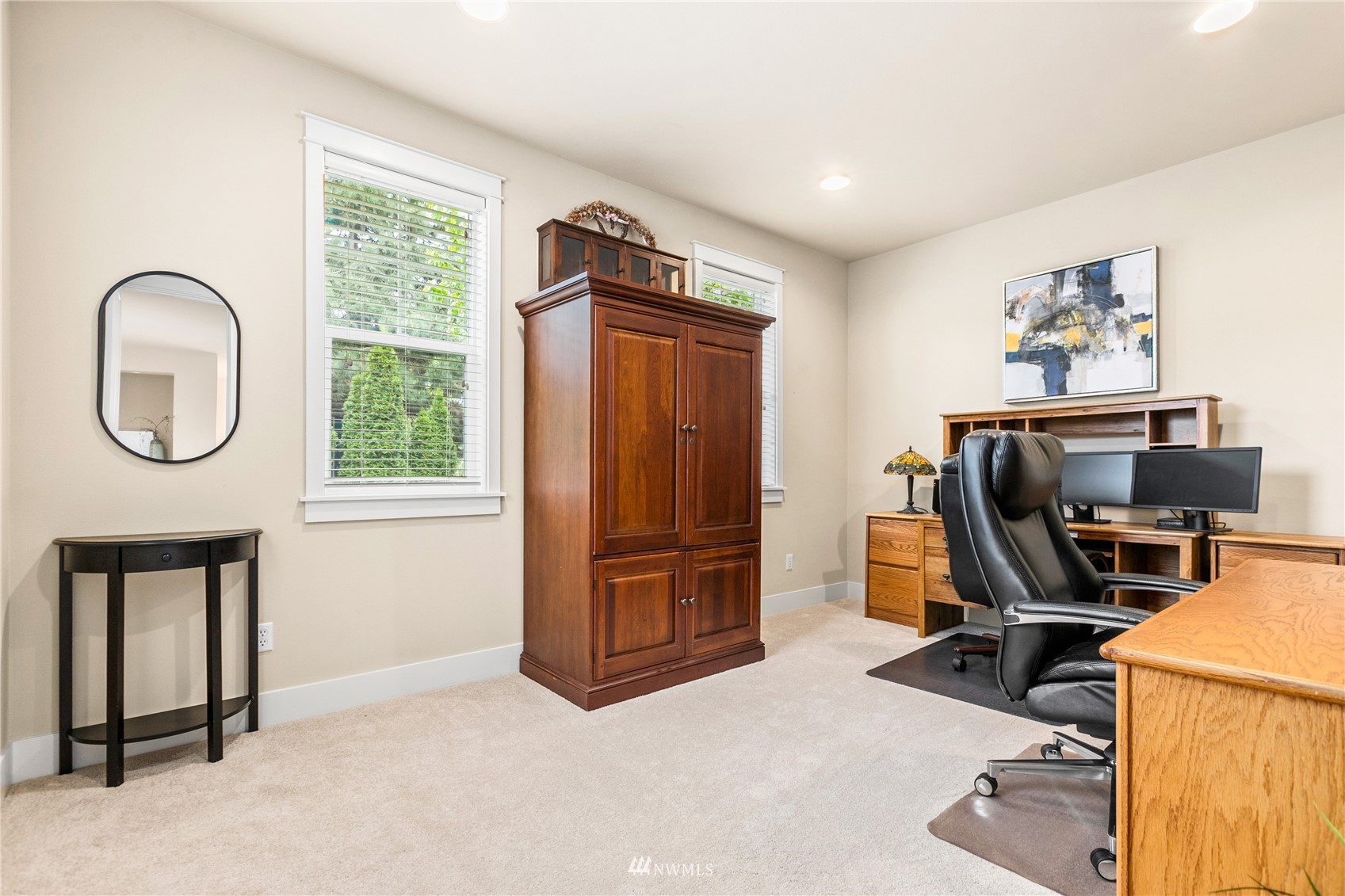 18407 36th Avenue Southeast Bothell, WA 98012 - Photo 14 of 39 a view of a workspace with furniture and a window