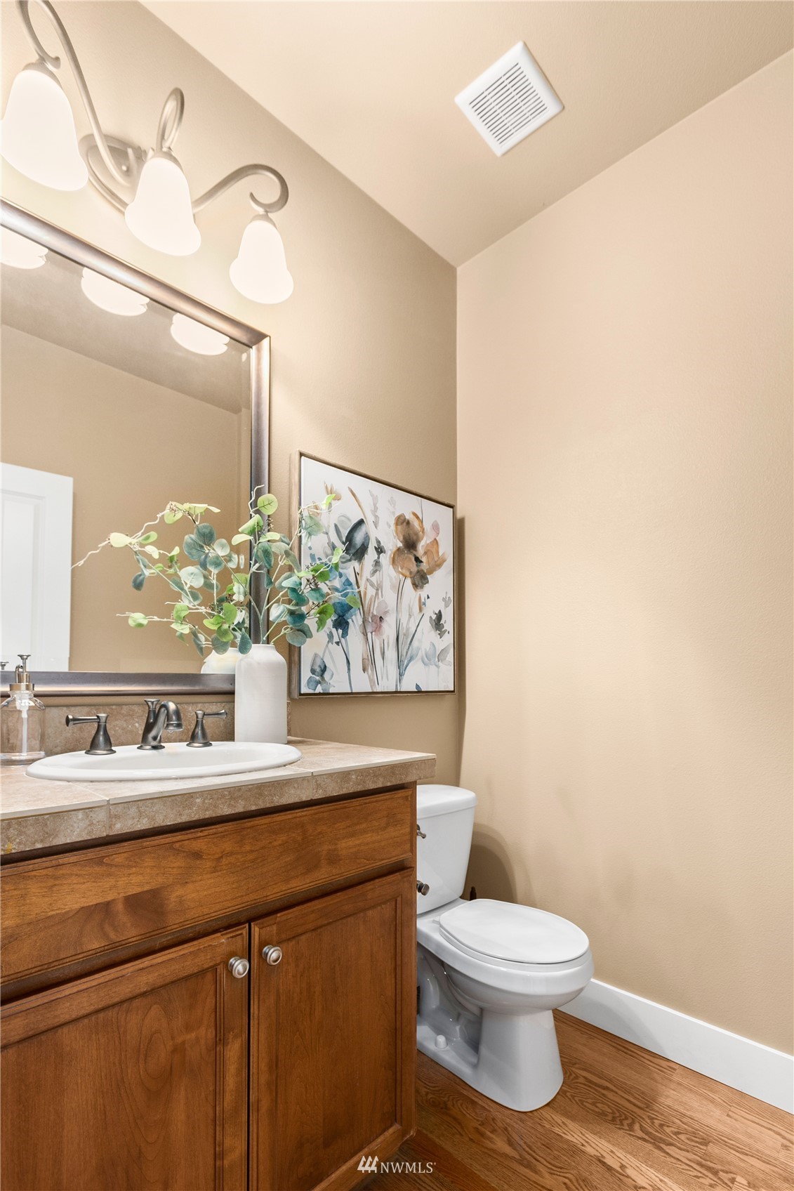 18407 36th Avenue Southeast Bothell, WA 98012 - Photo 15 of 39 a bathroom with a toilet sink and mirror