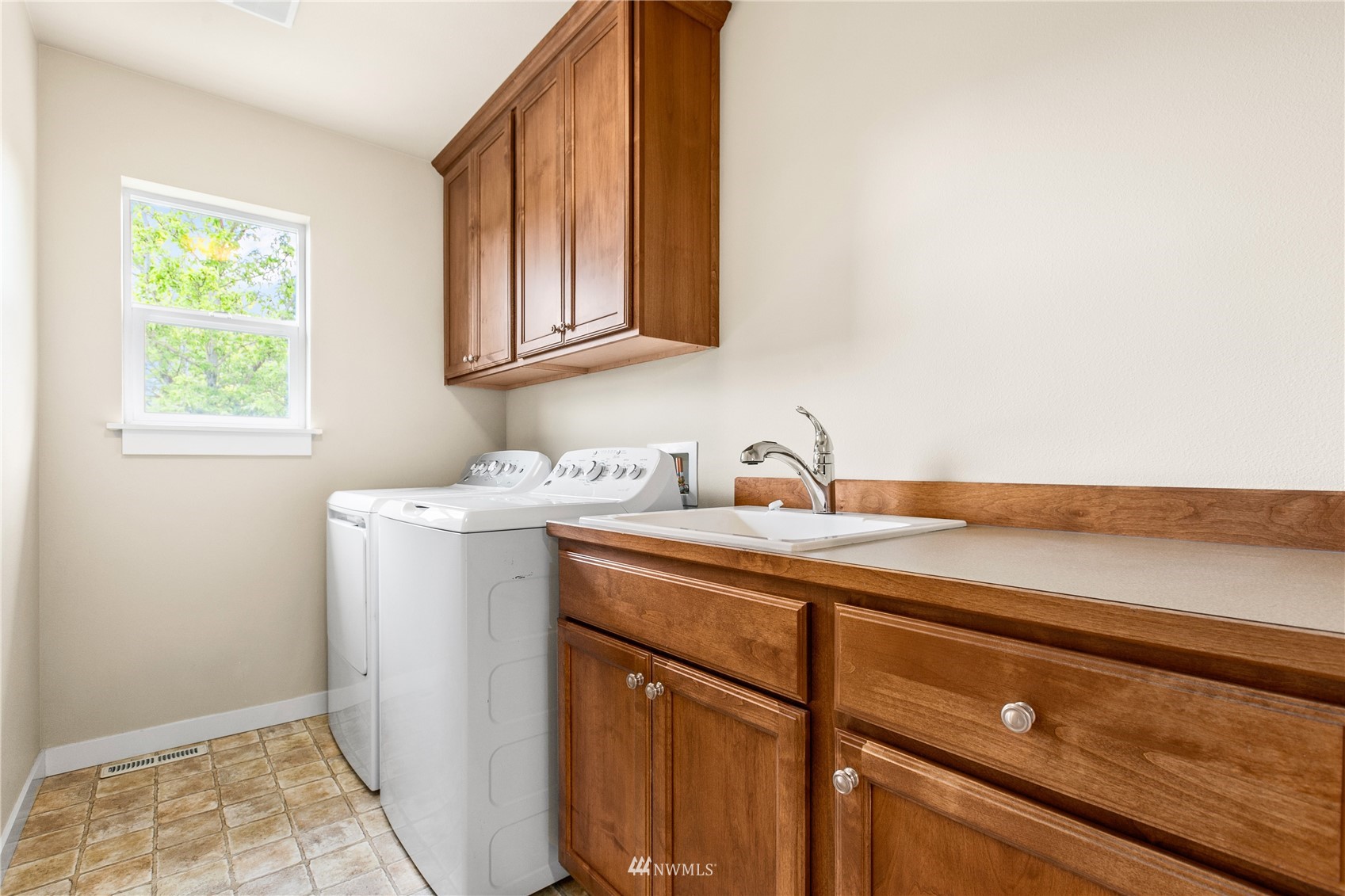 18407 36th Avenue Southeast Bothell, WA 98012 - Photo 28 of 39 a utility room with sink dryer and washer