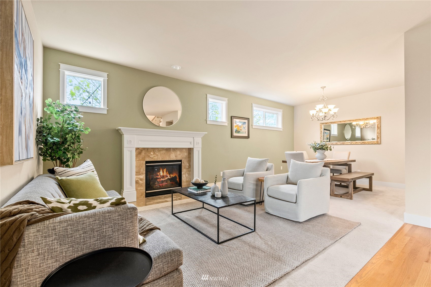 18407 36th Avenue Southeast Bothell, WA 98012 - Photo 4 of 39 a living room with furniture and a fireplace