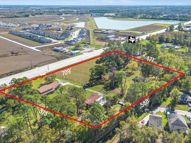 a front view of a house with a garden and porch