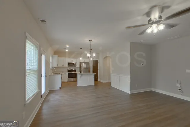 a view of a kitchen and kitchen with a sink