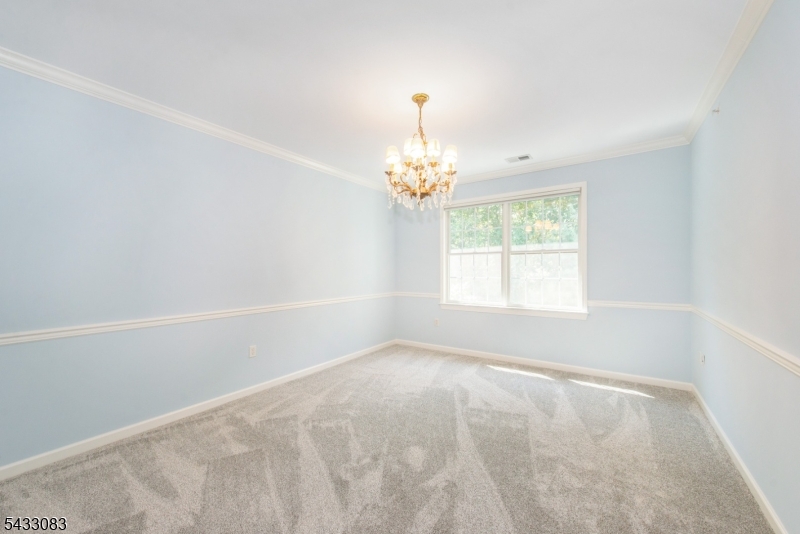 29 Ridgeview Lane, Unit 29 Mount Arlington, NJ 07856 - Photo 21 of 39 a view of empty room with window