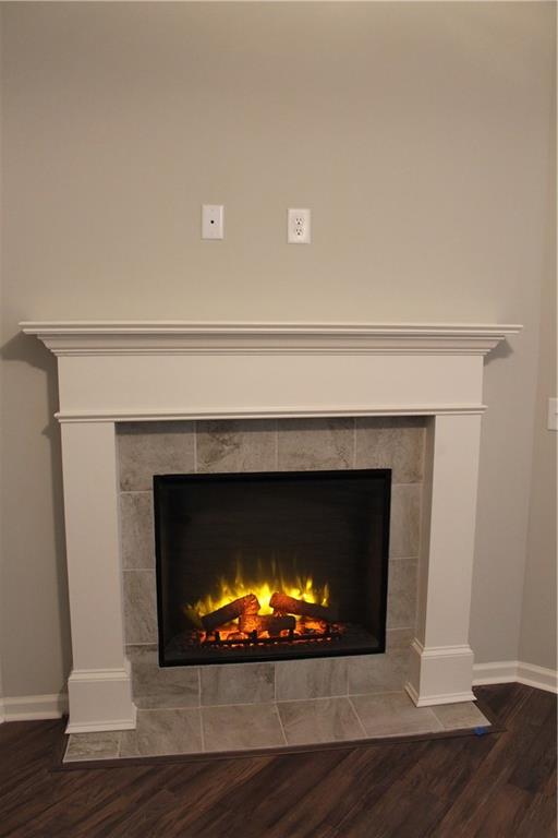 4741 Beacon Ridge Lane Flowery Branch, GA 30542 - Photo 7 of 15 a living room with a fireplace