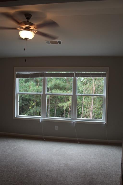 4741 Beacon Ridge Lane Flowery Branch, GA 30542 - Photo 9 of 15 a view of an empty room with a window