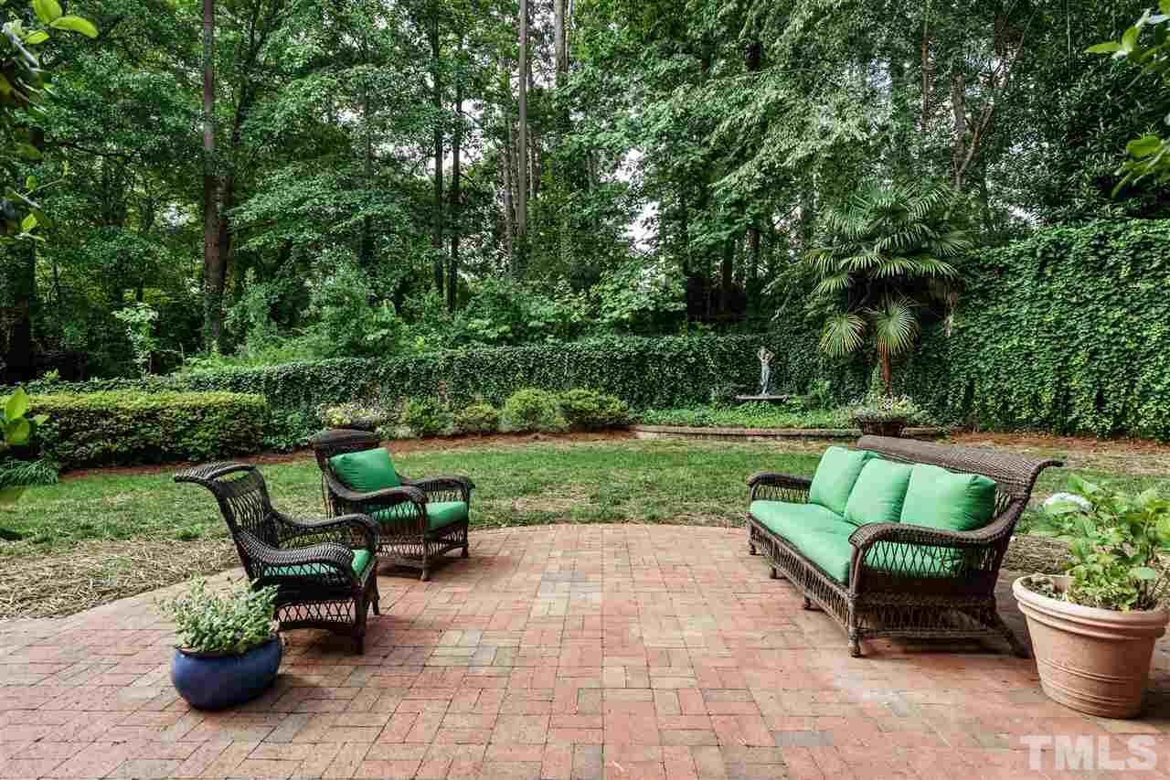 312 Forsyth Street Raleigh, NC 27609 - Photo 23 of 25 a view of a chair and table in the garden