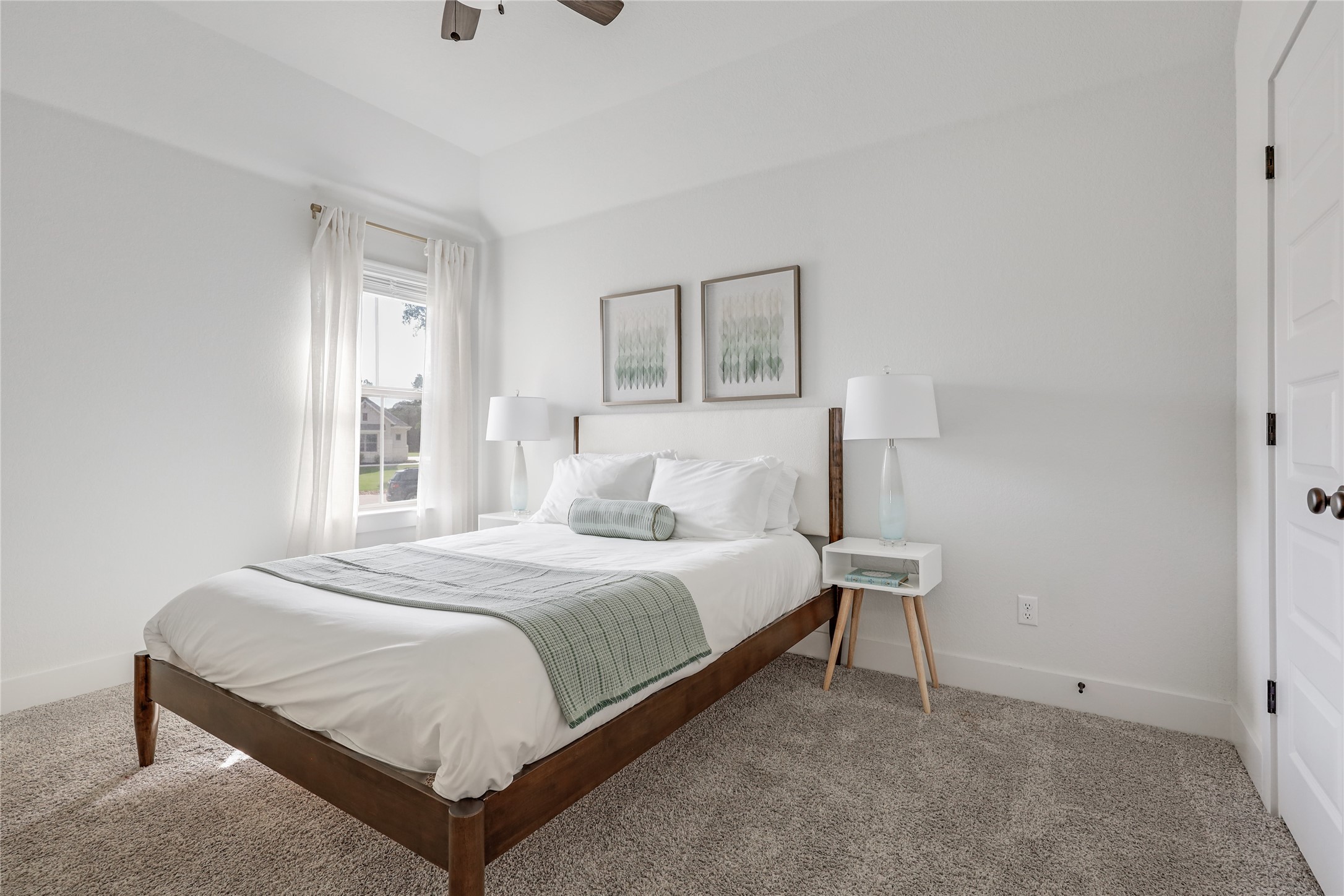 4905 Destination Way Jonestown, TX 78645 - Photo 14 of 27 a bedroom with a bed and a window