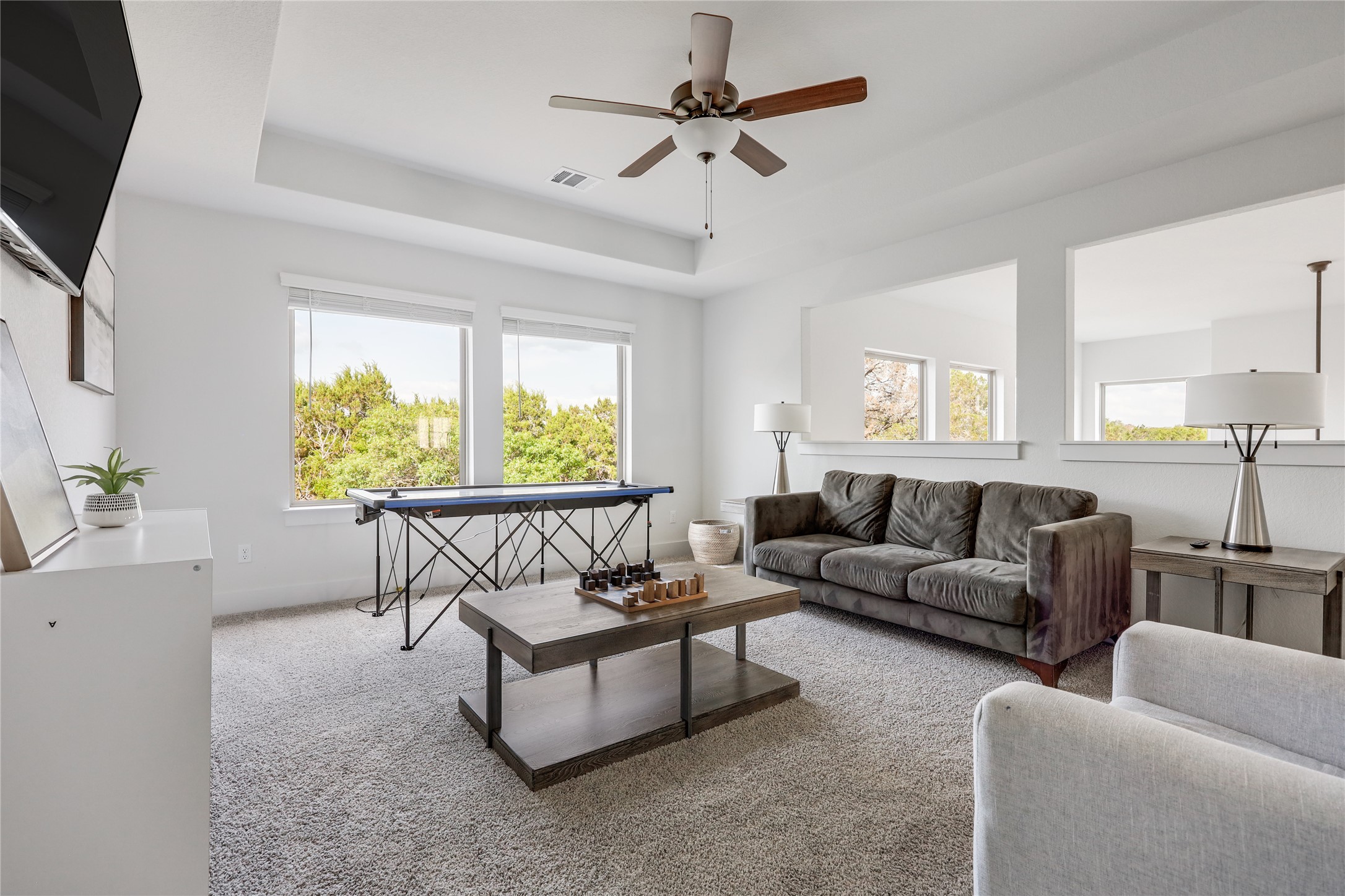 4905 Destination Way Jonestown, TX 78645 - Photo 15 of 27 a living room with furniture and a large window