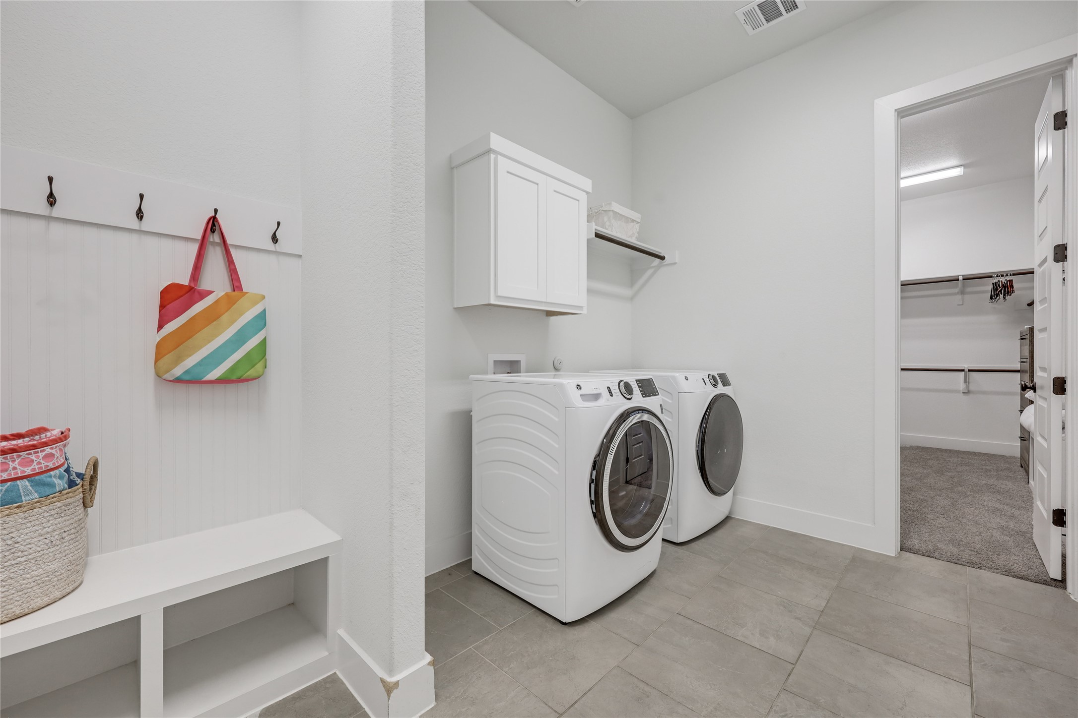 4905 Destination Way Jonestown, TX 78645 - Photo 19 of 27 a utility room with dryer and washer
