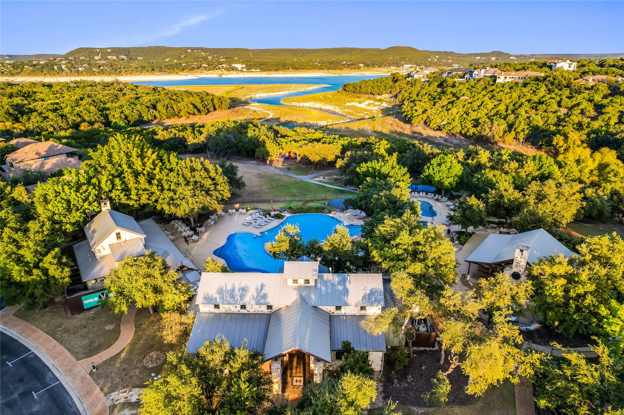 4905 Destination Way Jonestown, TX 78645 - Photo 26 of 27 an aerial view of residential houses with outdoor space and swimming pool