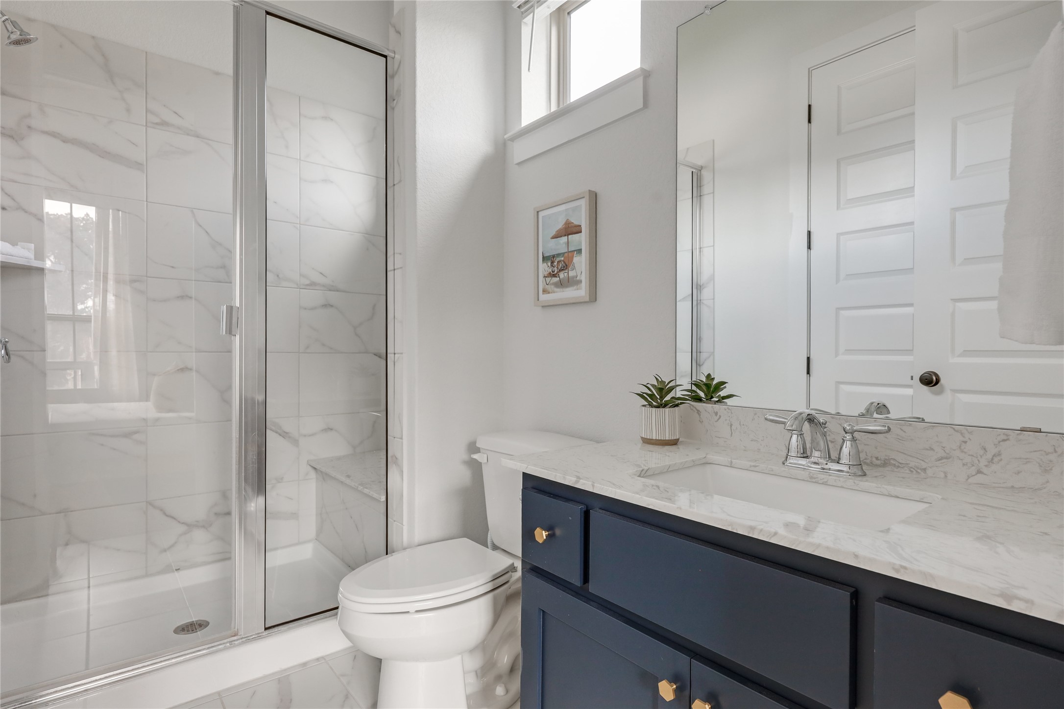 4905 Destination Way Jonestown, TX 78645 - Photo 10 of 27 a bathroom with a sink toilet and shower