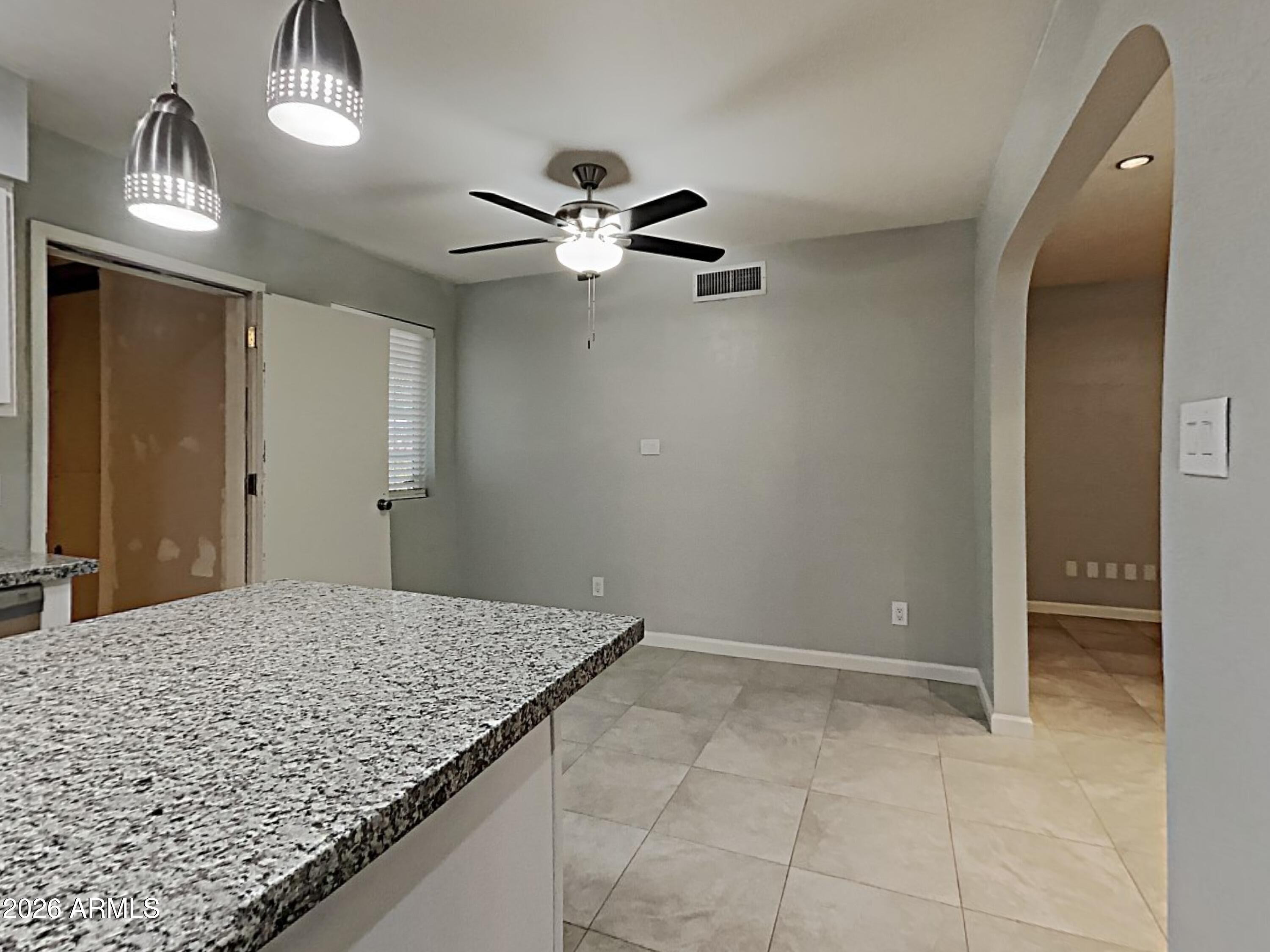 1001 West Villa Rita Drive Phoenix, AZ 85023 - Photo 11 of 26 a view of a hallway with a chandelier fan