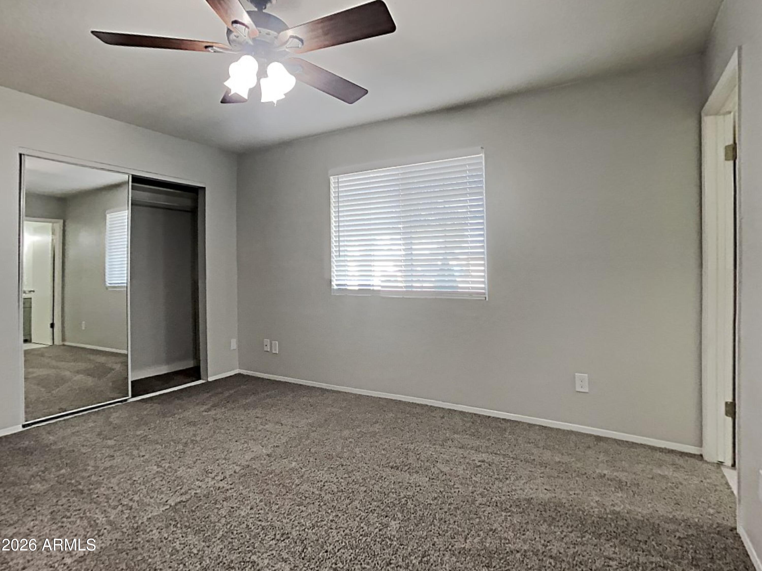 1001 West Villa Rita Drive Phoenix, AZ 85023 - Photo 14 of 26 a view of an empty room with a window