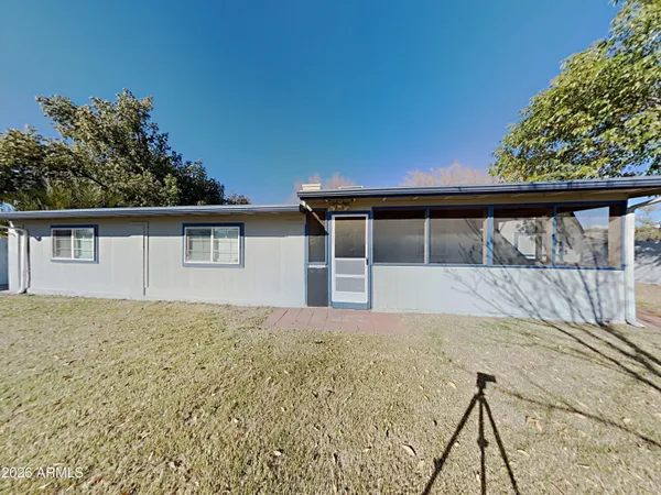 front view of a house with a big yard