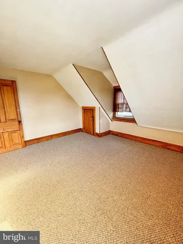 a view of a storage & utility room with a sink