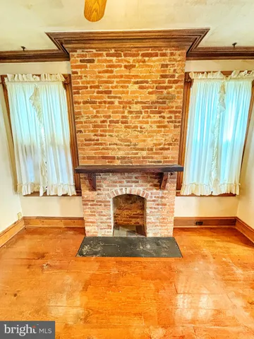 a kitchen with stainless steel appliances granite countertop a stove and a refrigerator
