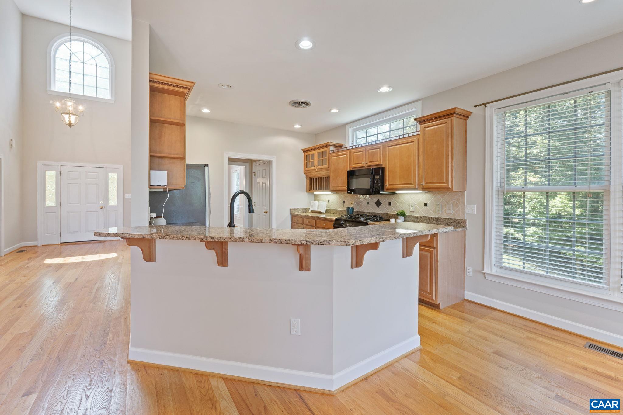 680 Explorers Road Charlottesville, VA 22911 - Photo 13 of 46 a view of kitchen with wooden floor