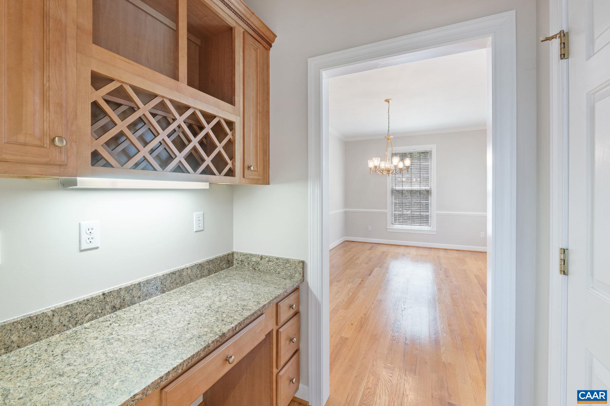 680 Explorers Road Charlottesville, VA 22911 - Photo 14 of 46 a kitchen with stainless steel appliances granite countertop a sink and a granite counter tops