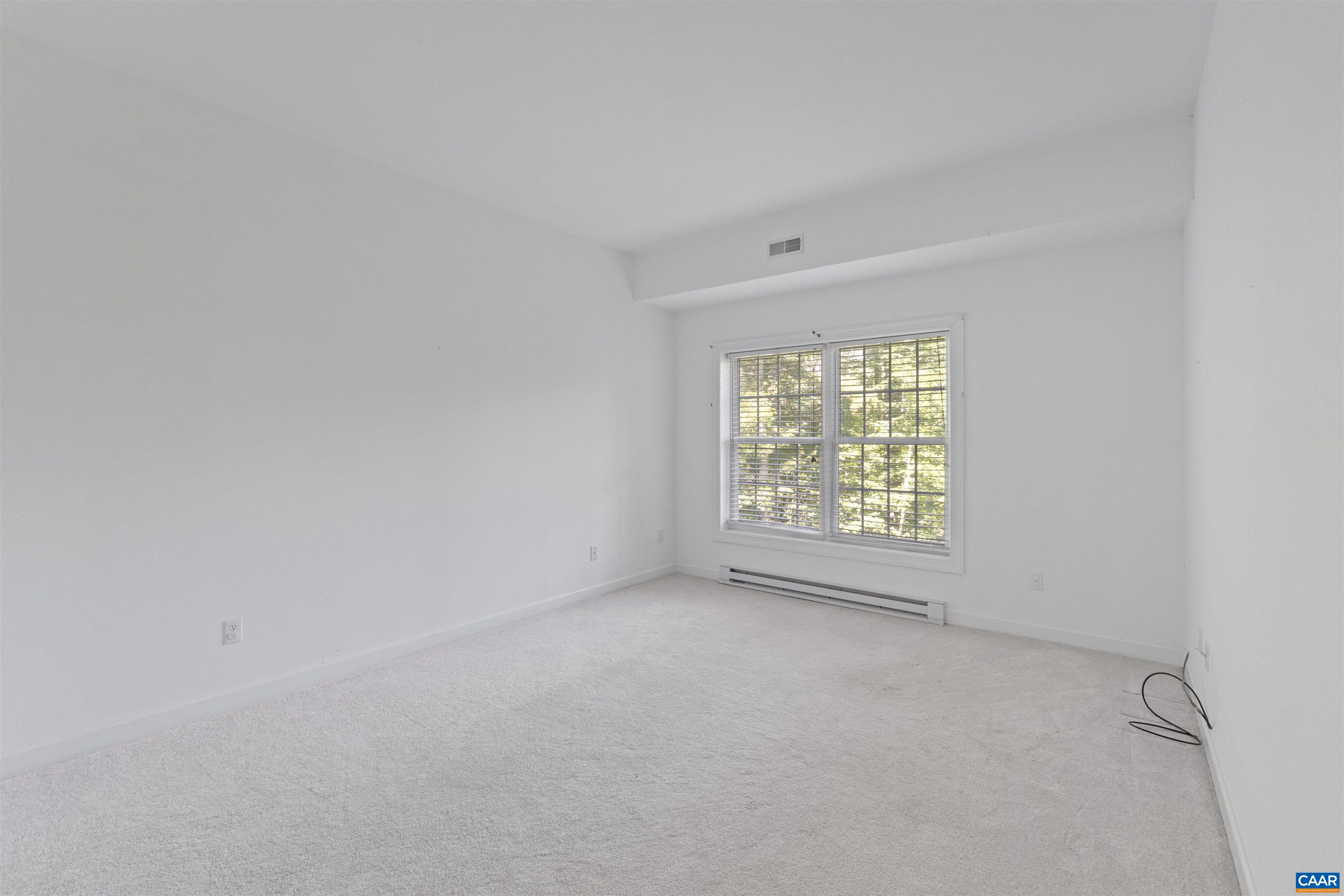 680 Explorers Road Charlottesville, VA 22911 - Photo 31 of 46 an empty room with a window
