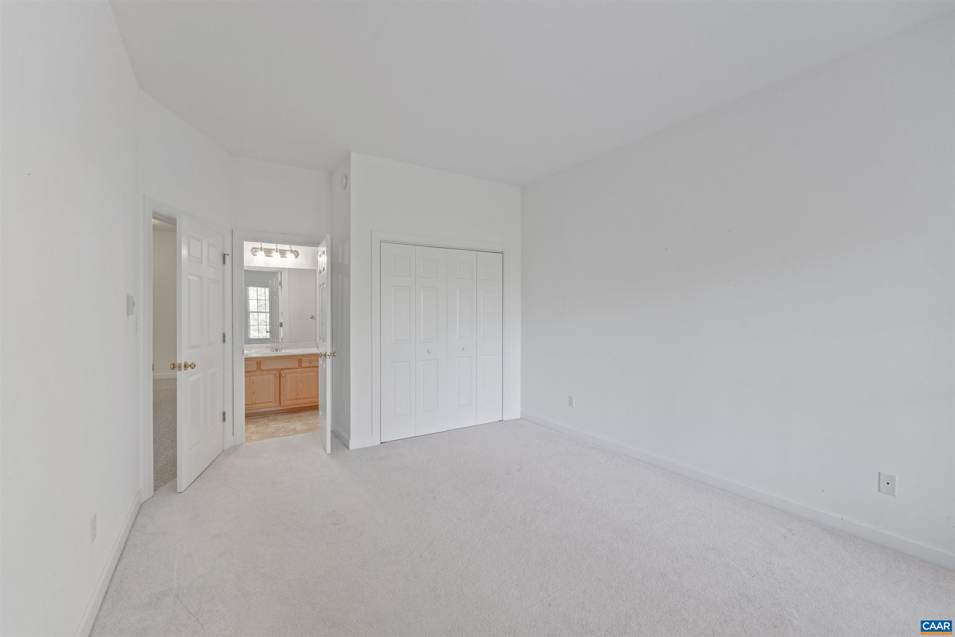 680 Explorers Road Charlottesville, VA 22911 - Photo 32 of 46 a view of a big room with closet and a bathroom