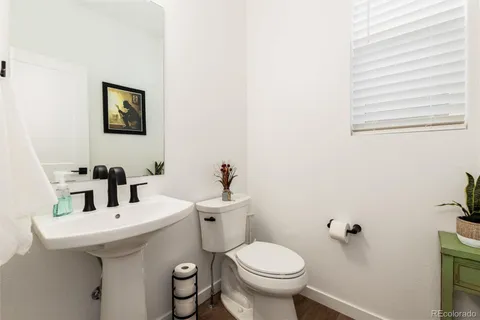 a bedroom with a bed and a table