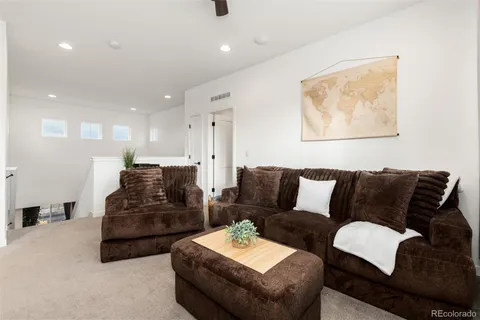 a bedroom with a workspace