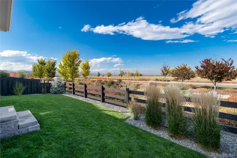 an aerial view of residential building with ocean view