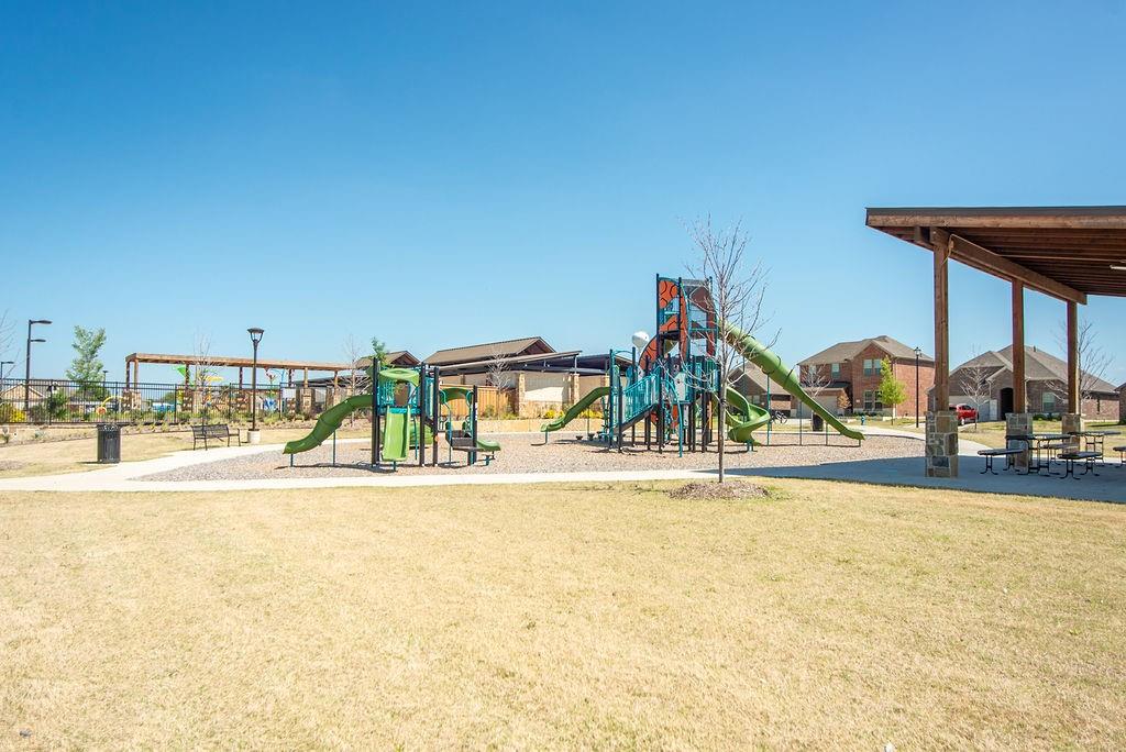 608 Daybreak Lane Lavon, TX 75166 - Photo 28 of 36 a view of a swimming pool and an outdoor space