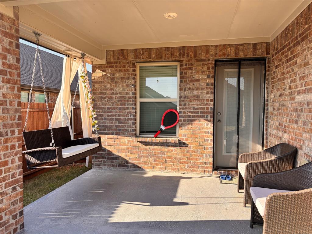 608 Daybreak Lane Lavon, TX 75166 - Photo 35 of 36 a bedroom with a bed and a window