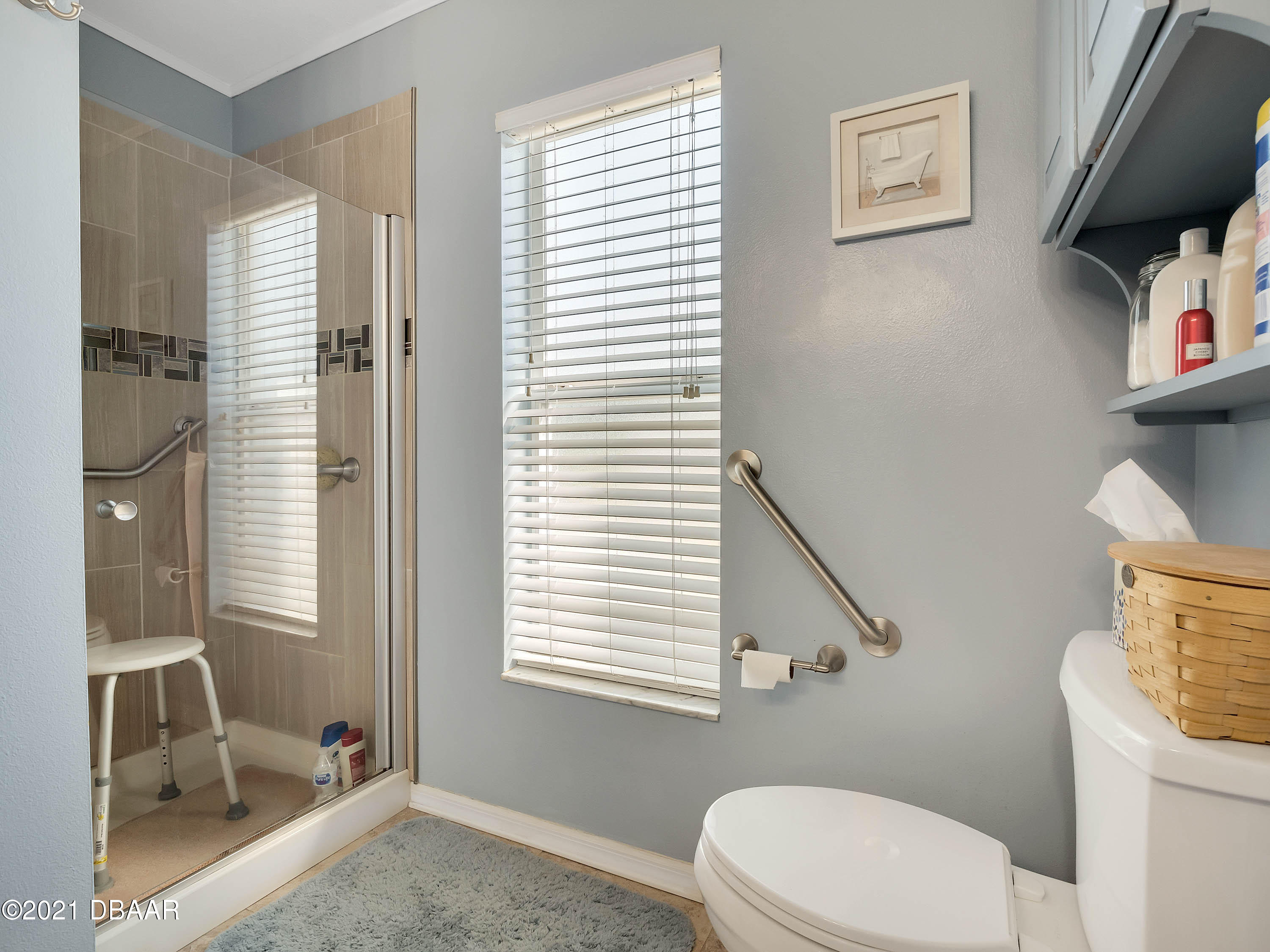 2800 Larkspur Road DeLand, FL 32724 - Photo 16 of 33 a bathroom with a toilet sink and shower