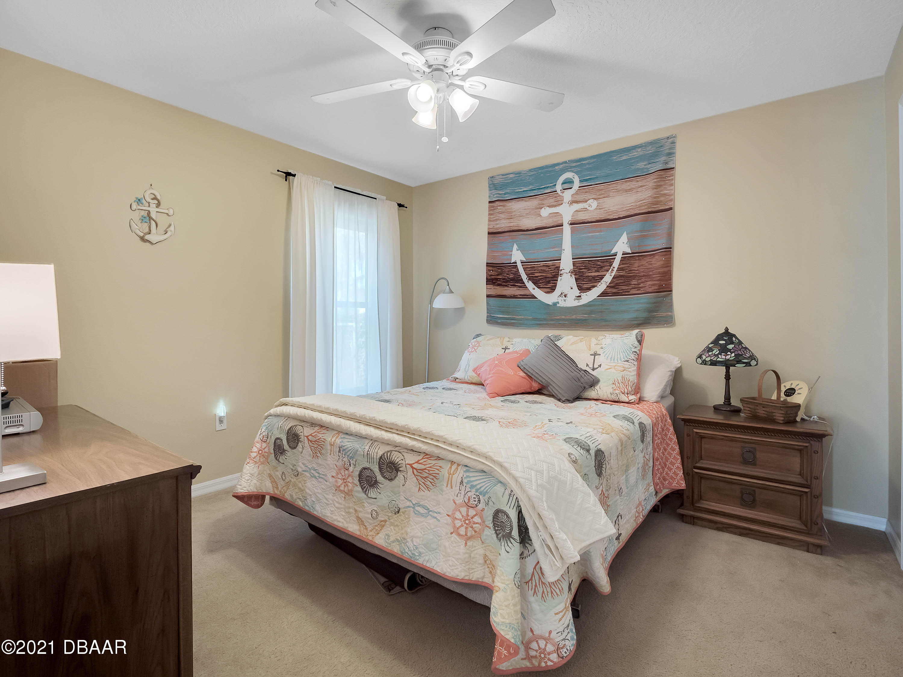 2800 Larkspur Road DeLand, FL 32724 - Photo 18 of 33 a bedroom with a bed and a window