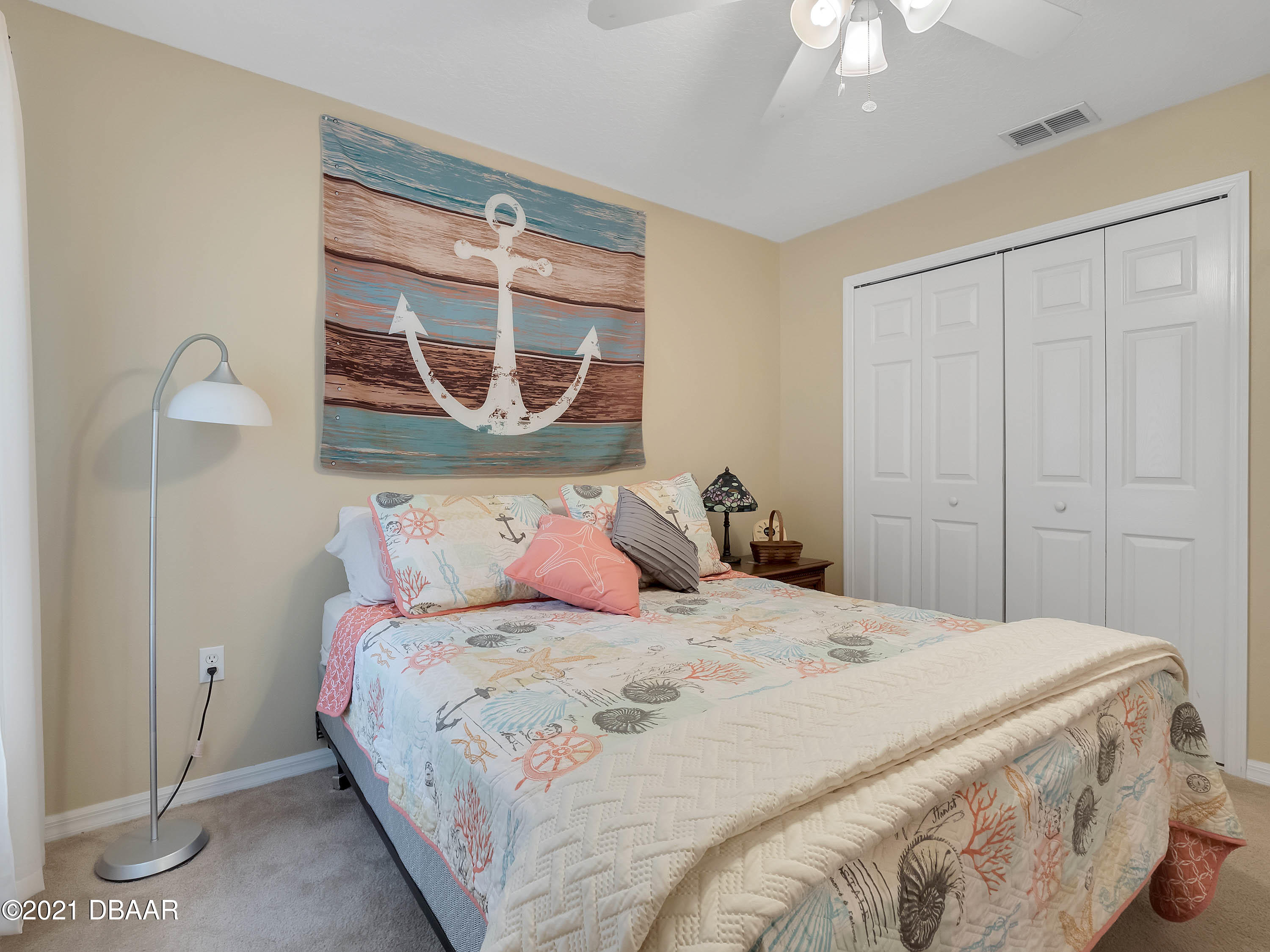 2800 Larkspur Road DeLand, FL 32724 - Photo 19 of 33 a bedroom with a bed and a window