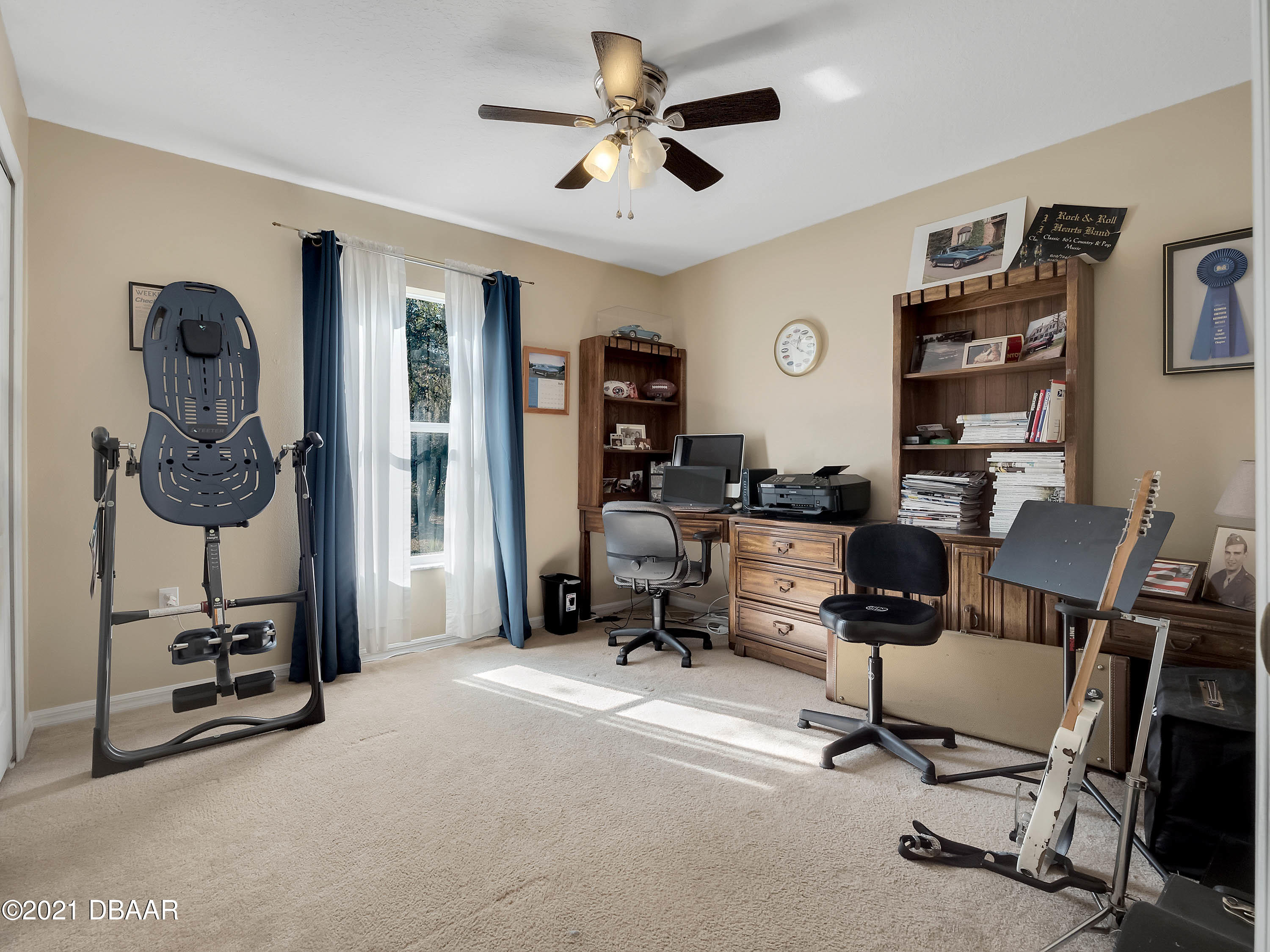 2800 Larkspur Road DeLand, FL 32724 - Photo 20 of 33 a view of a livingroom with workspace and a couch