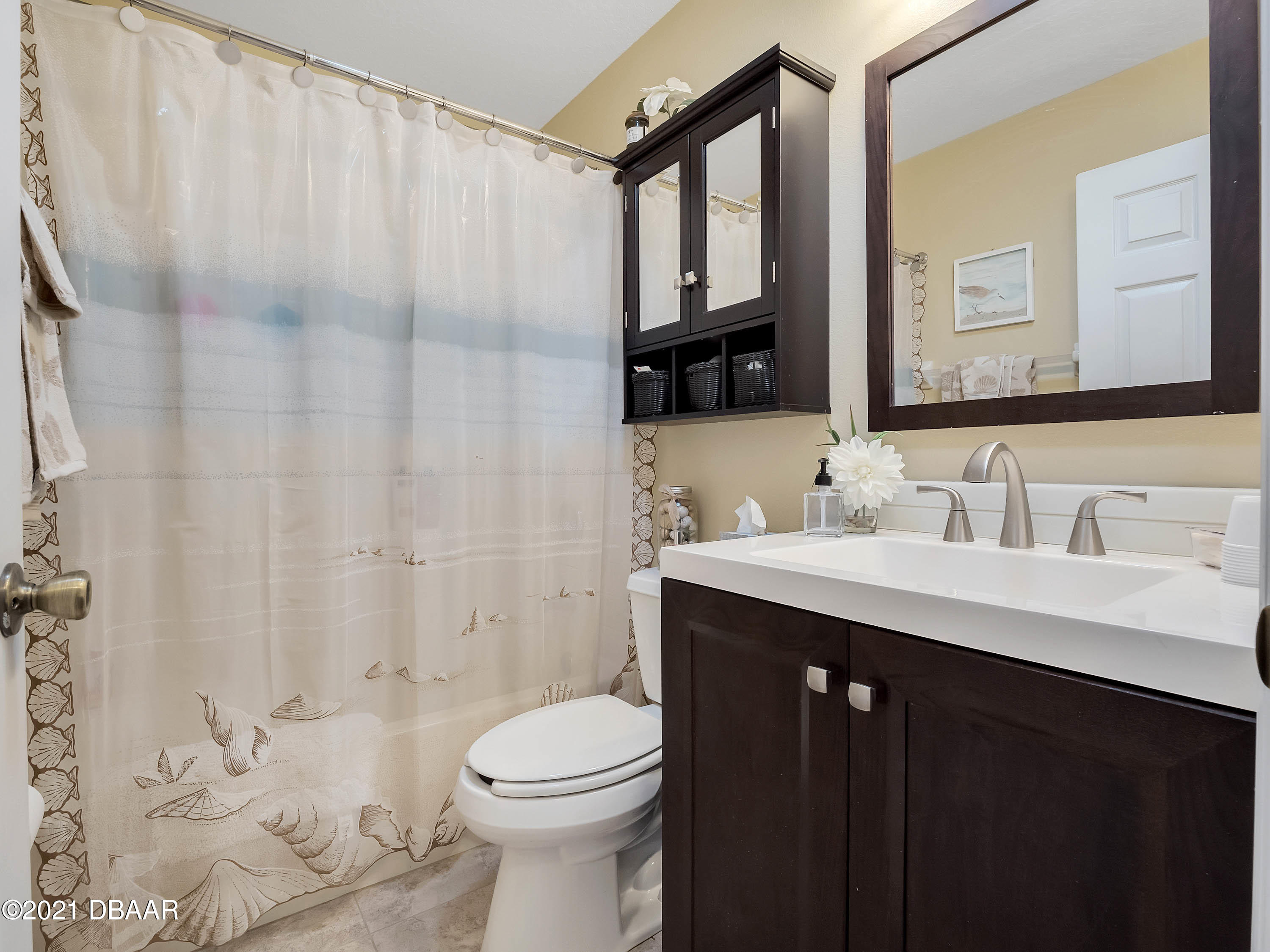 2800 Larkspur Road DeLand, FL 32724 - Photo 21 of 33 a bathroom with a sink a toilet and shower