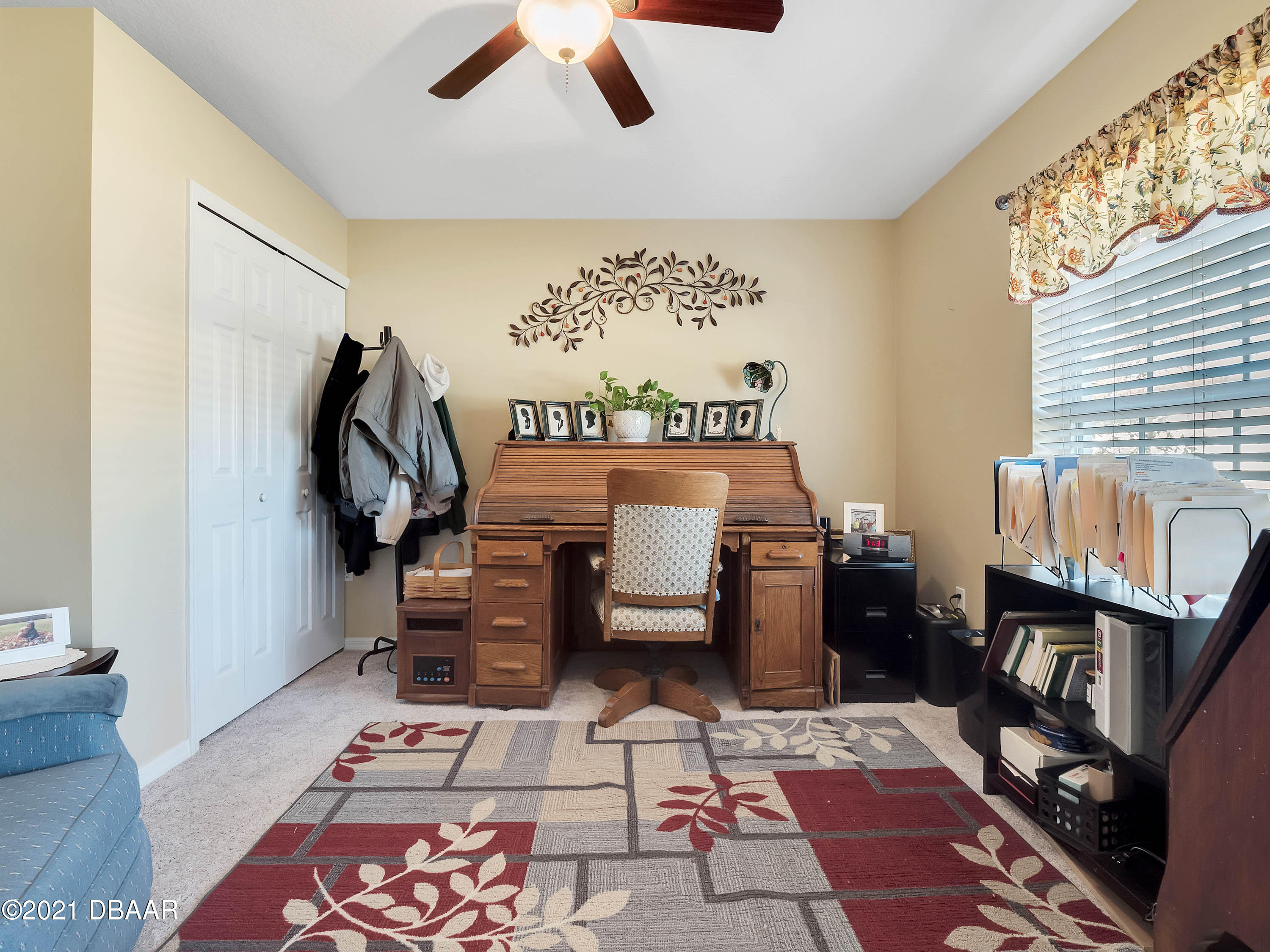 2800 Larkspur Road DeLand, FL 32724 - Photo 23 of 33 a bedroom with furniture and a window