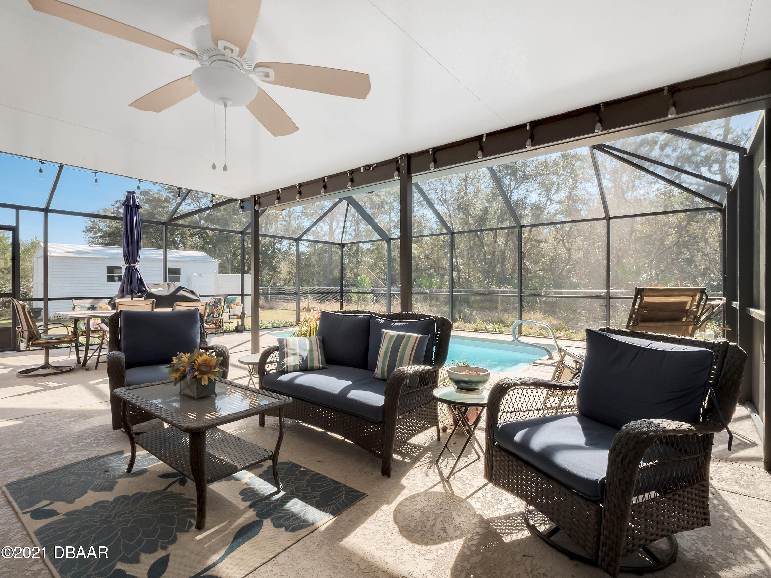 2800 Larkspur Road DeLand, FL 32724 - Photo 24 of 33 a living room with furniture and a large window