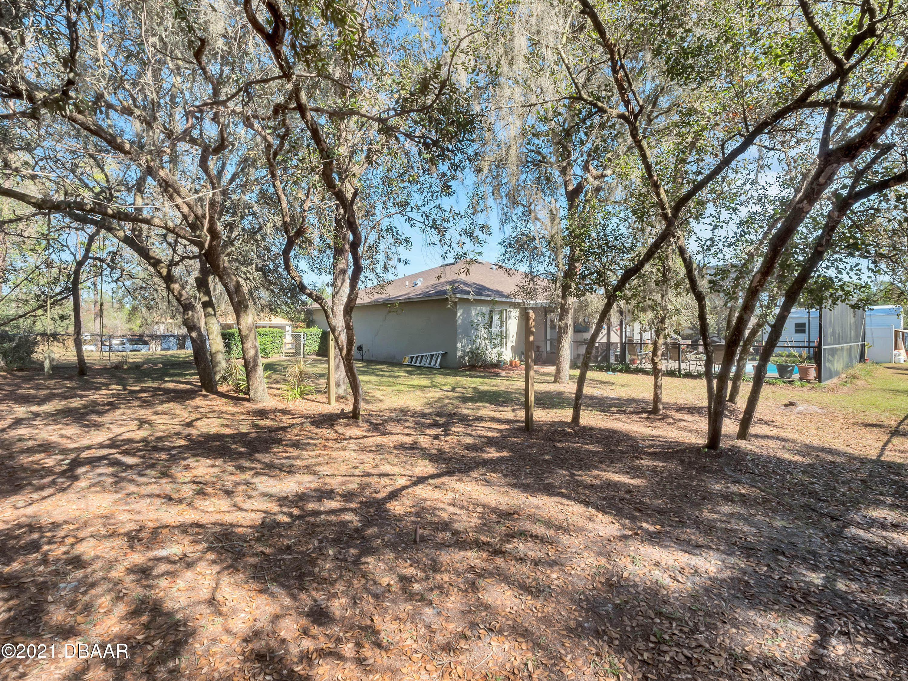 2800 Larkspur Road DeLand, FL 32724 - Photo 32 of 33 a view of a house with a yard covered in snow