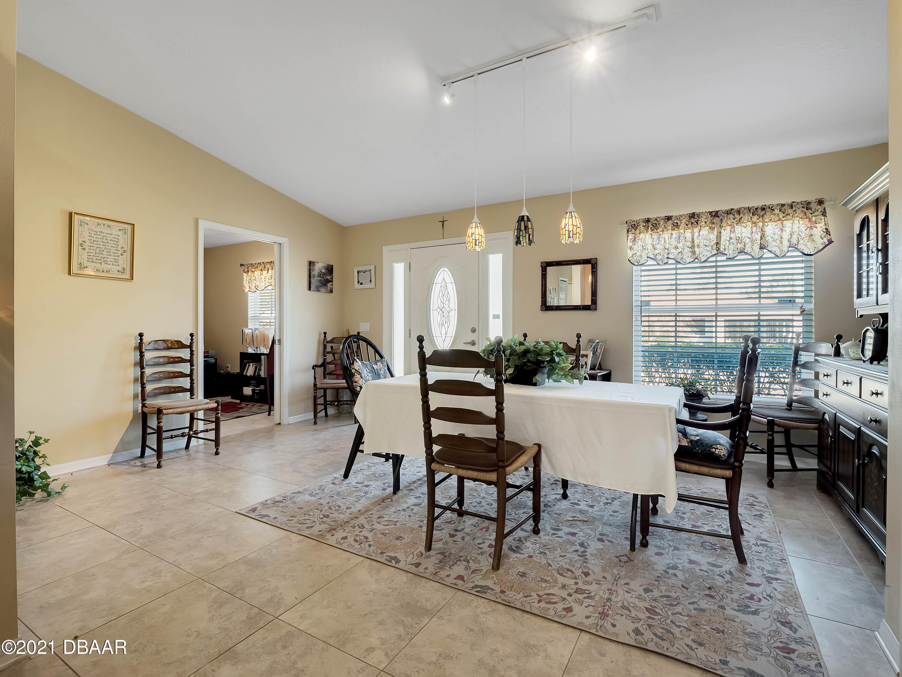 2800 Larkspur Road DeLand, FL 32724 - Photo 5 of 33 a living room with furniture a rug and a table