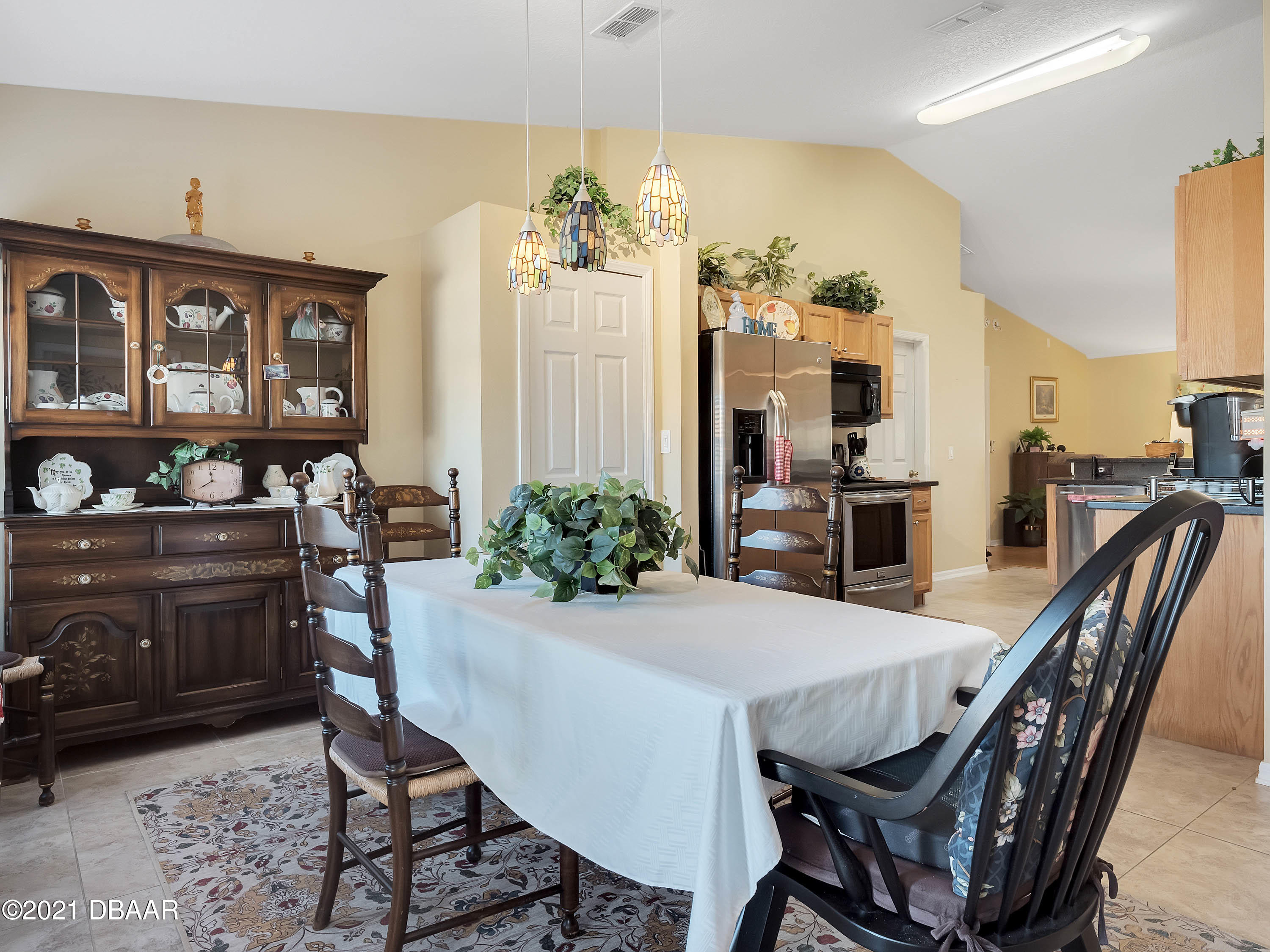 2800 Larkspur Road DeLand, FL 32724 - Photo 6 of 33 a view of a dining room with furniture