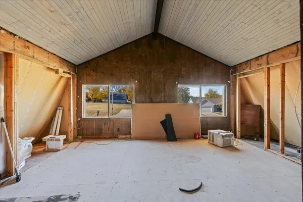 an empty room with windows