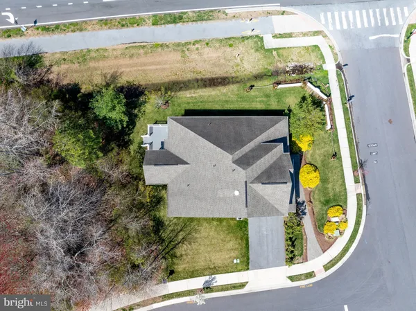 an aerial view of a house with swimming pool